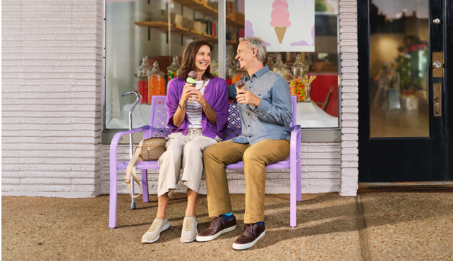 A couple is enjoying ice cream.